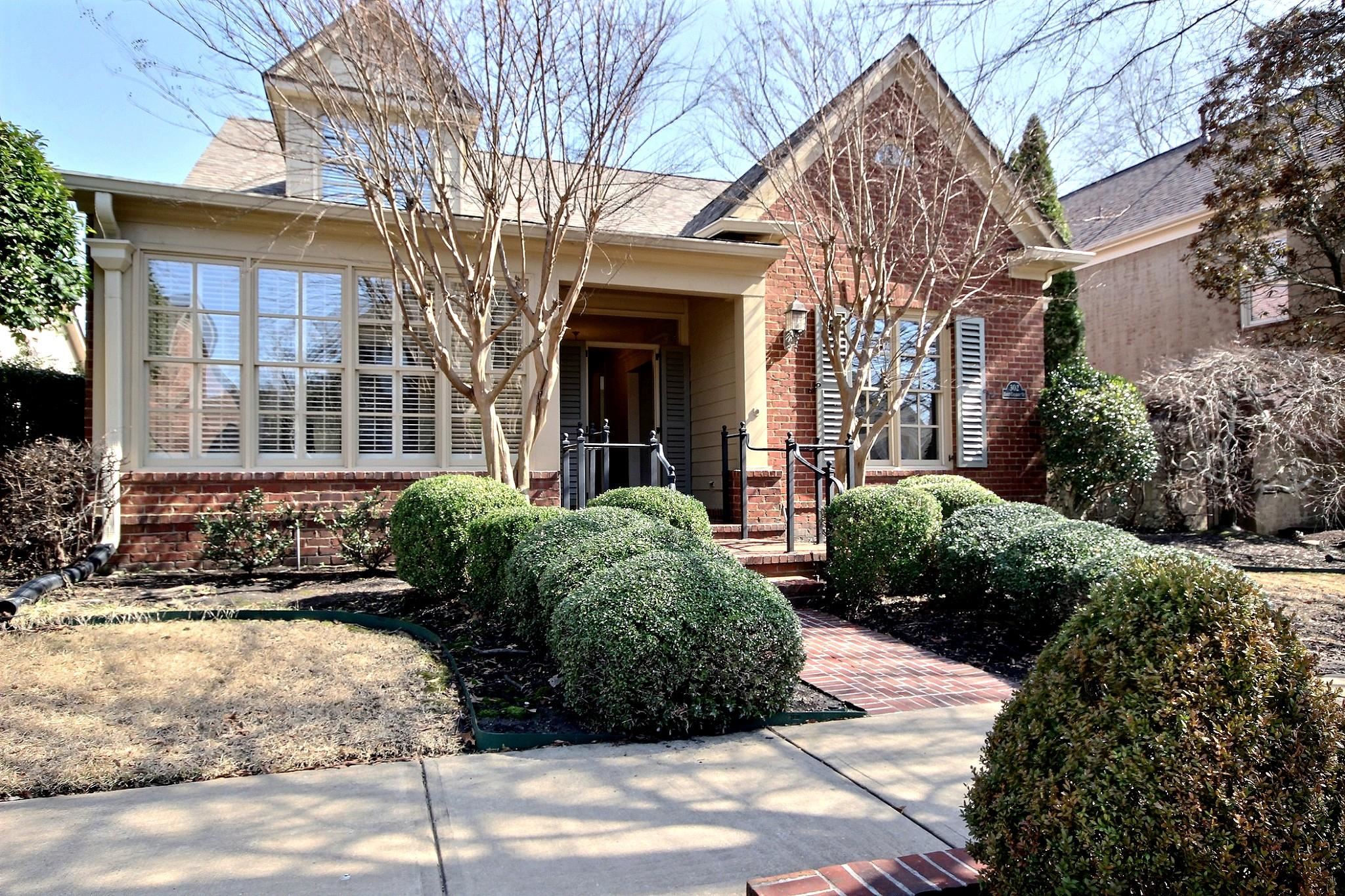 Impressive curb appeal with professional landscaping