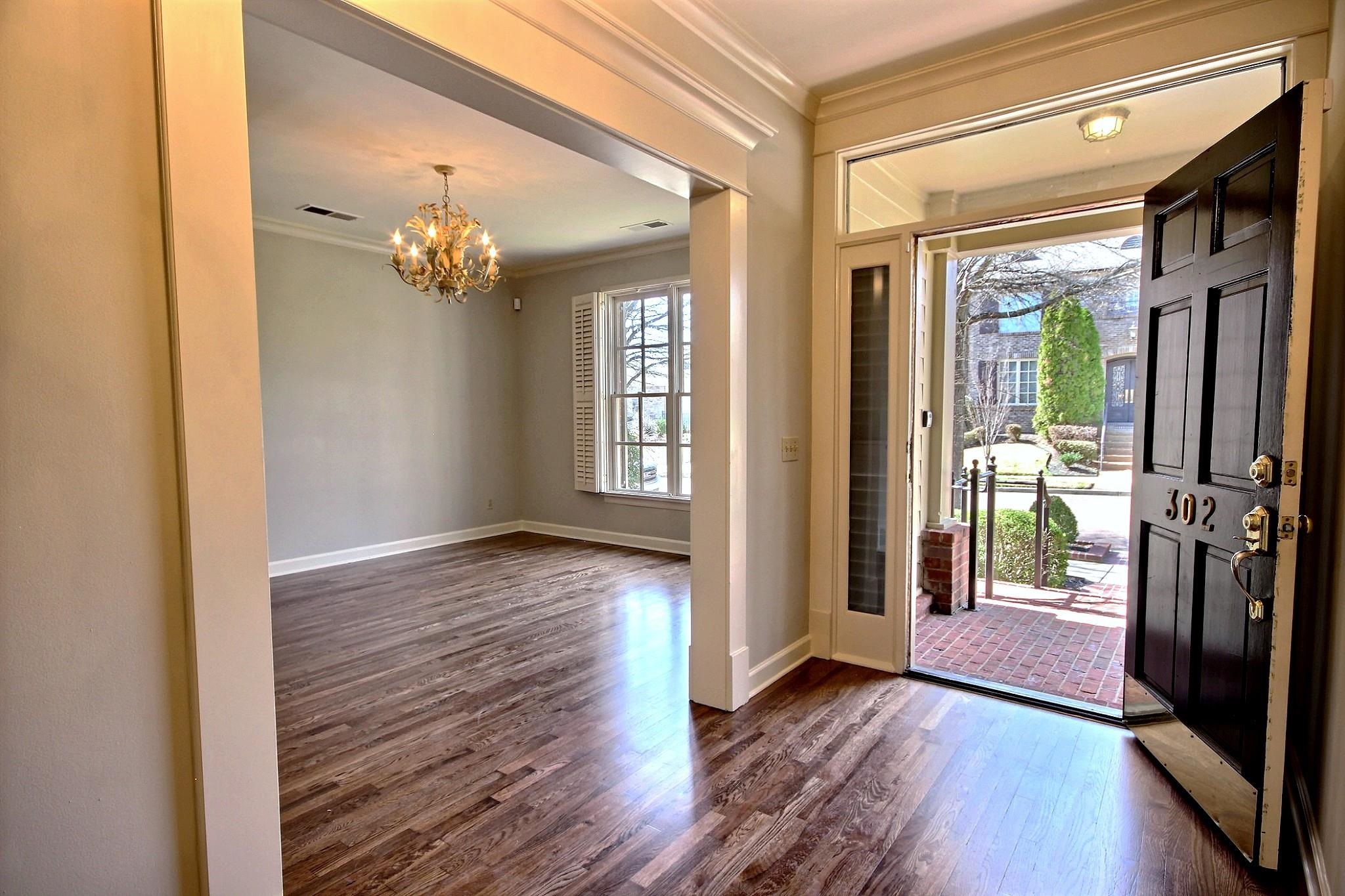 302 Colbert Street East Collierville, TN 38017 - Photo 3 of 33 Open front entry with lots of light