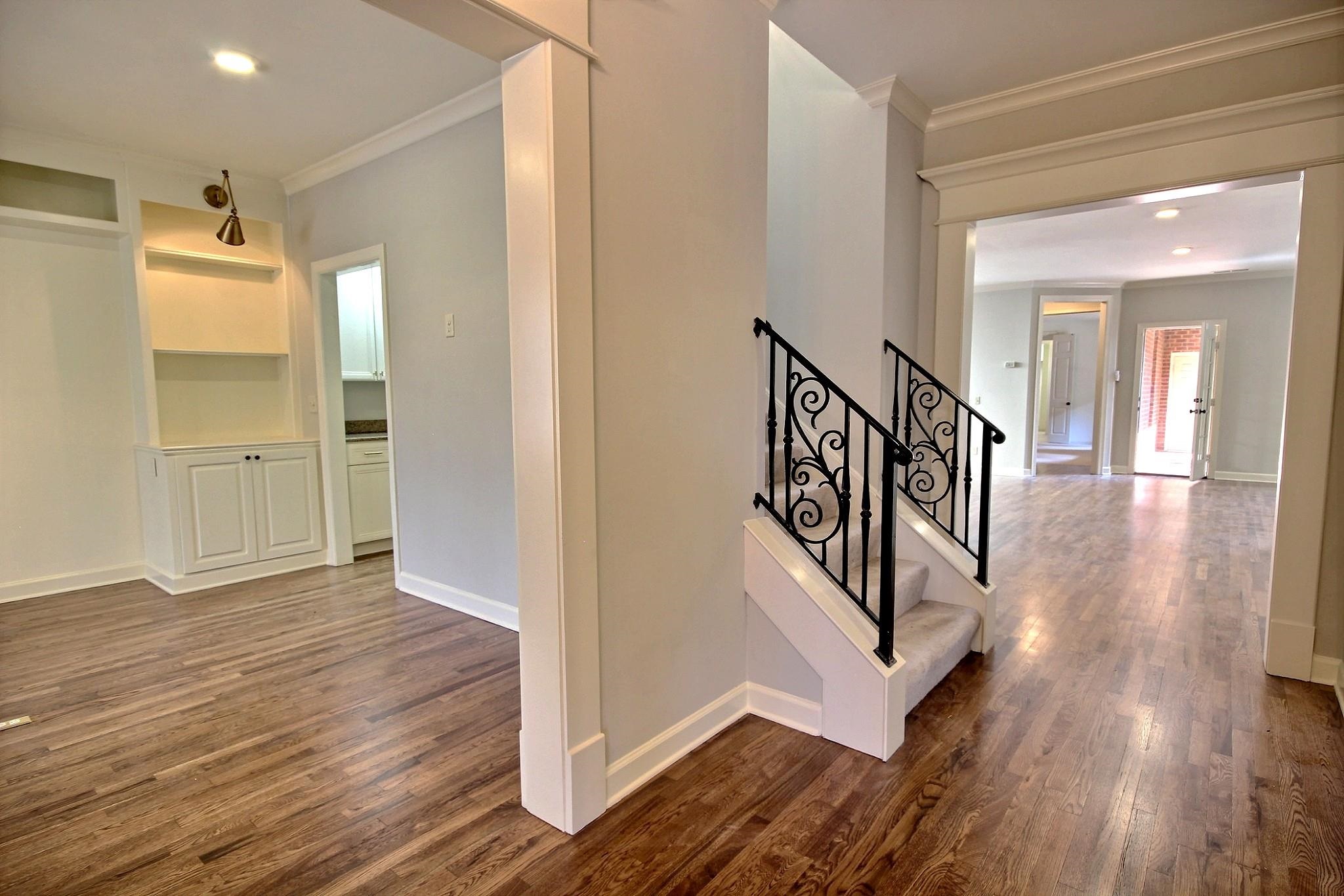 302 Colbert Street East Collierville, TN 38017 - Photo 5 of 33 Front entry hall with wrought iron stairs leading up