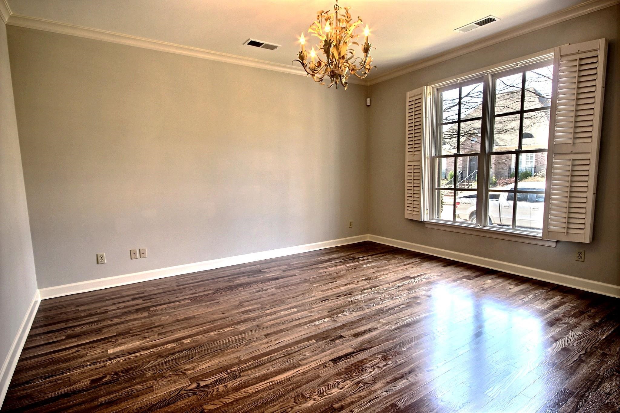 302 Colbert Street East Collierville, TN 38017 - Photo 6 of 33 Front living room could be converted to 3rd bedroom down
