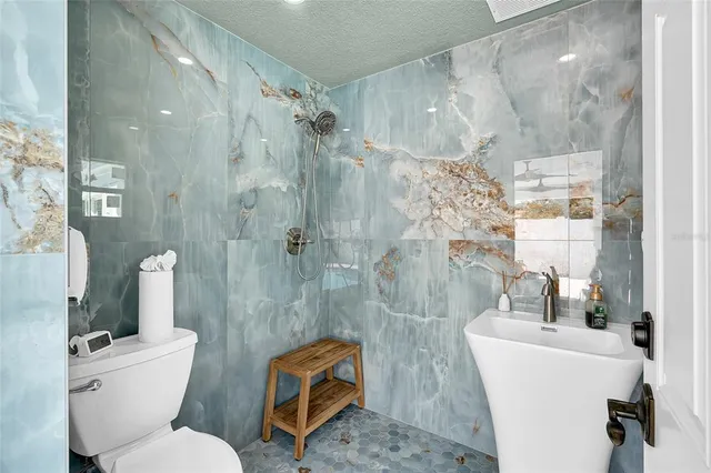 a view of swimming pool with seating