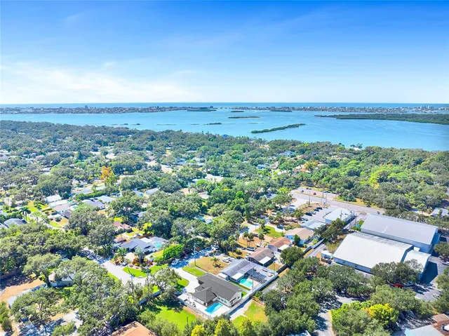 a bed room with a bed and a window