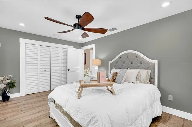 a view of a garage with a bike and a car