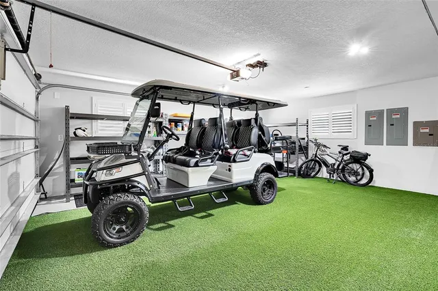 a living room with fireplace furniture and a flat screen tv