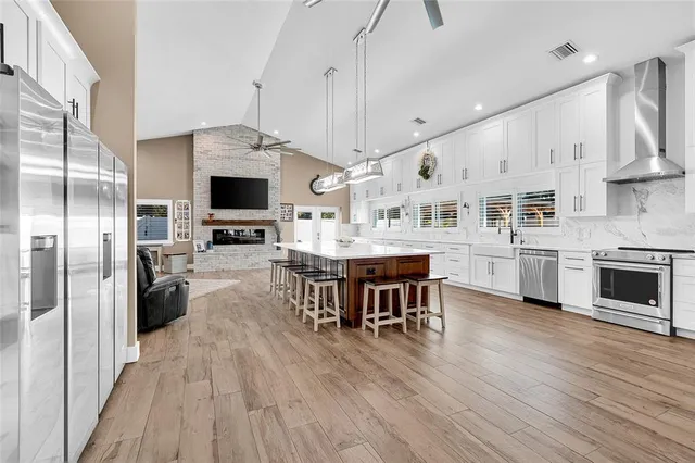 an aerial view of a house with a swimming pool