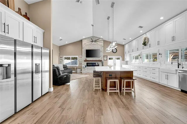 a view of a swimming pool with a patio