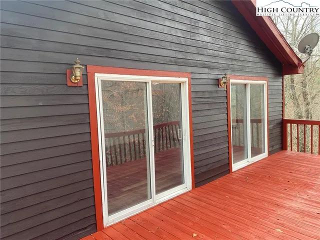 a porch with wooden floor