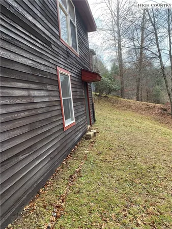 a view of a backyard of the house