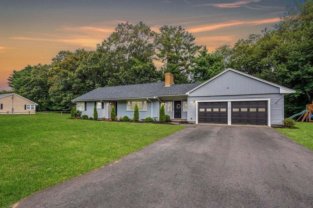 10 Walker Road Topsfield, MA 01983 - Photo 1 of 41 a front view of a house with a garden