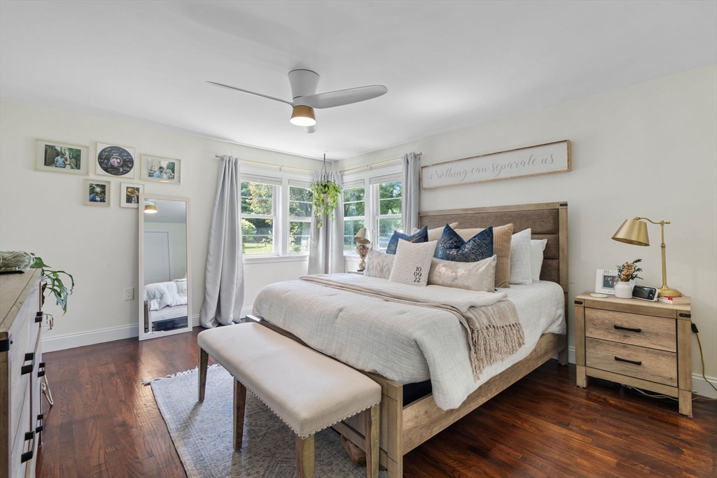 10 Walker Road Topsfield, MA 01983 - Photo 14 of 41 a bedroom with a bed and a tv on the dresser