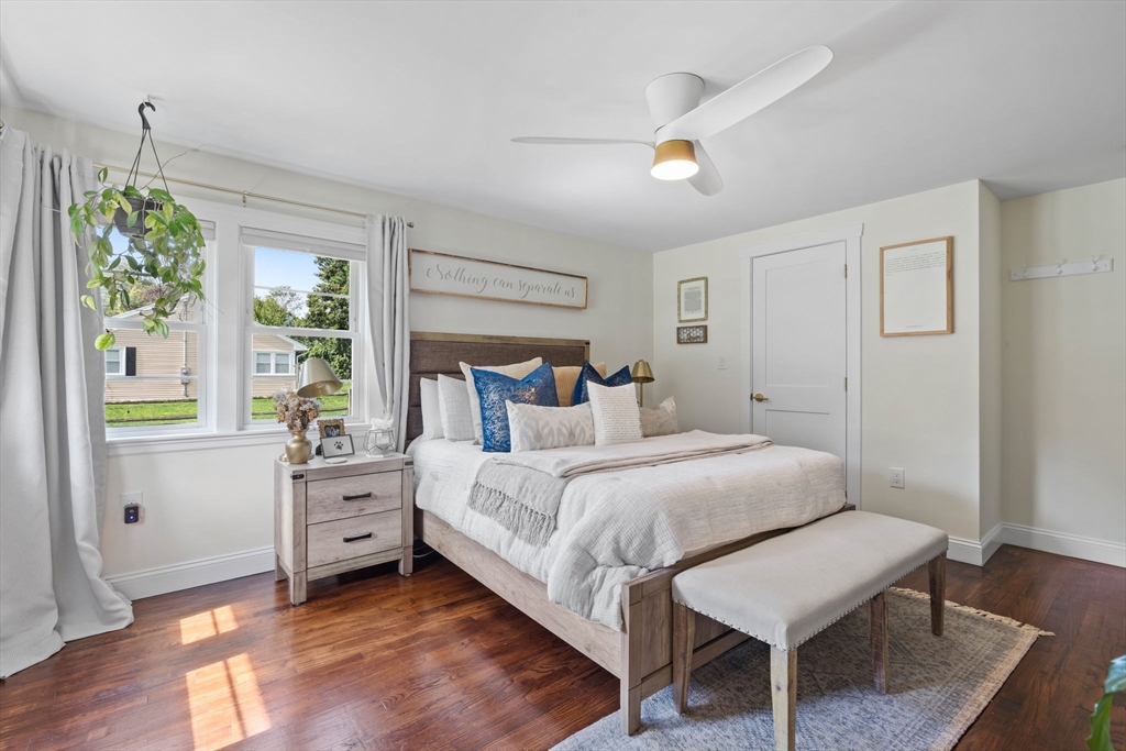 10 Walker Road Topsfield, MA 01983 - Photo 15 of 41 a bedroom with a bed and a window