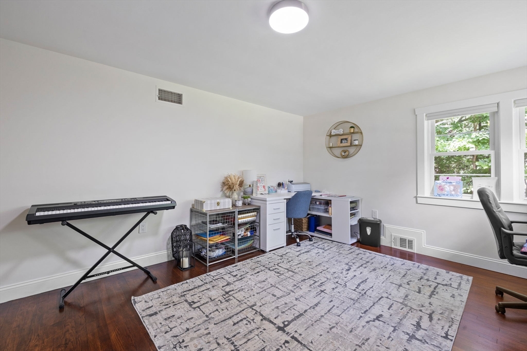 10 Walker Road Topsfield, MA 01983 - Photo 23 of 41 a bed room with a bed and a window