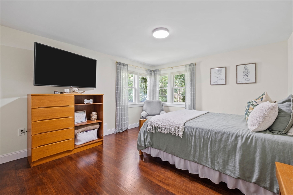 10 Walker Road Topsfield, MA 01983 - Photo 24 of 41 a bedroom with a bed and a flat screen tv
