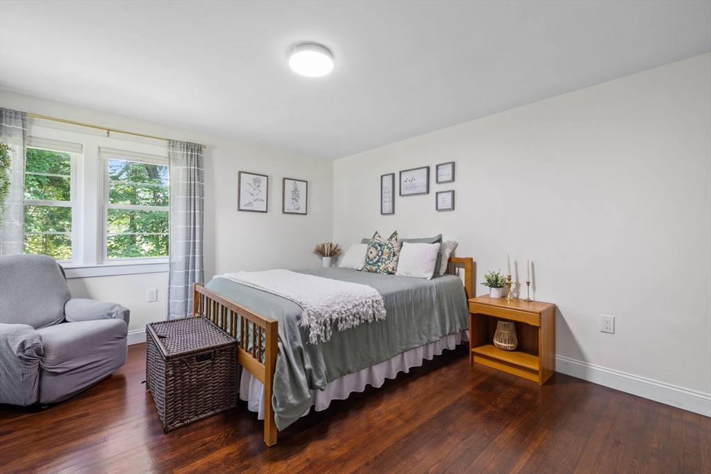 10 Walker Road Topsfield, MA 01983 - Photo 25 of 41 a bedroom with a bed and a couch