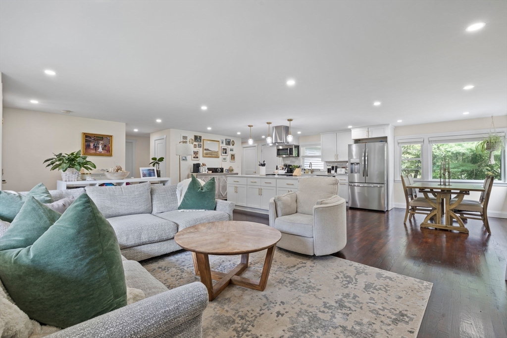 10 Walker Road Topsfield, MA 01983 - Photo 3 of 41 a living room with furniture and a dining table with wooden floor