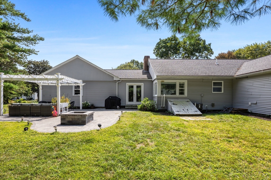10 Walker Road Topsfield, MA 01983 - Photo 36 of 41 a view of a house with a patio