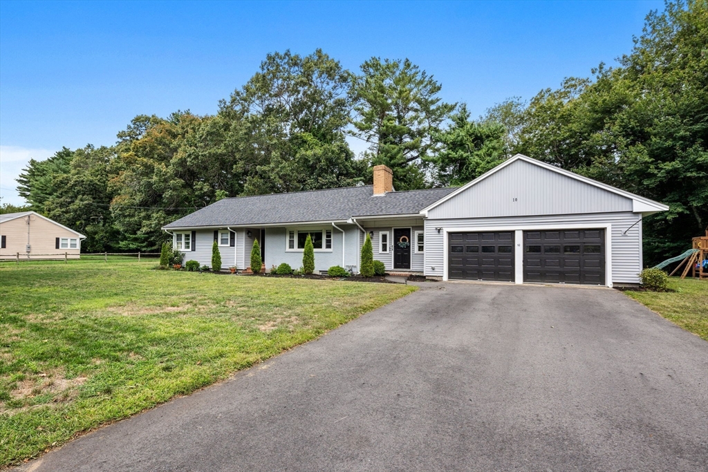 10 Walker Road Topsfield, MA 01983 - Photo 40 of 41 a front view of a house with garden
