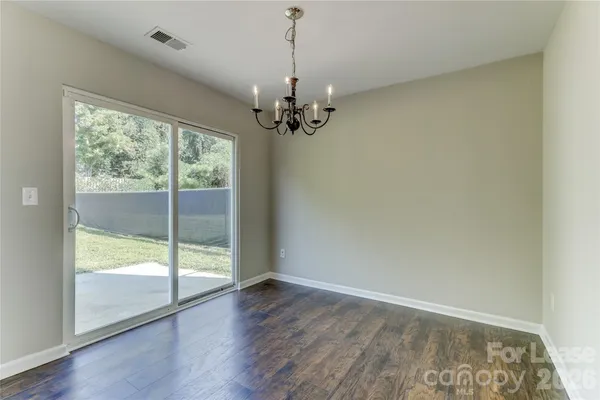 a view of a room with a large window