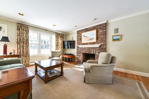 157 Bristol Road Wellesley, MA 02481 - Photo 3 of 20 a living room with furniture and a fireplace