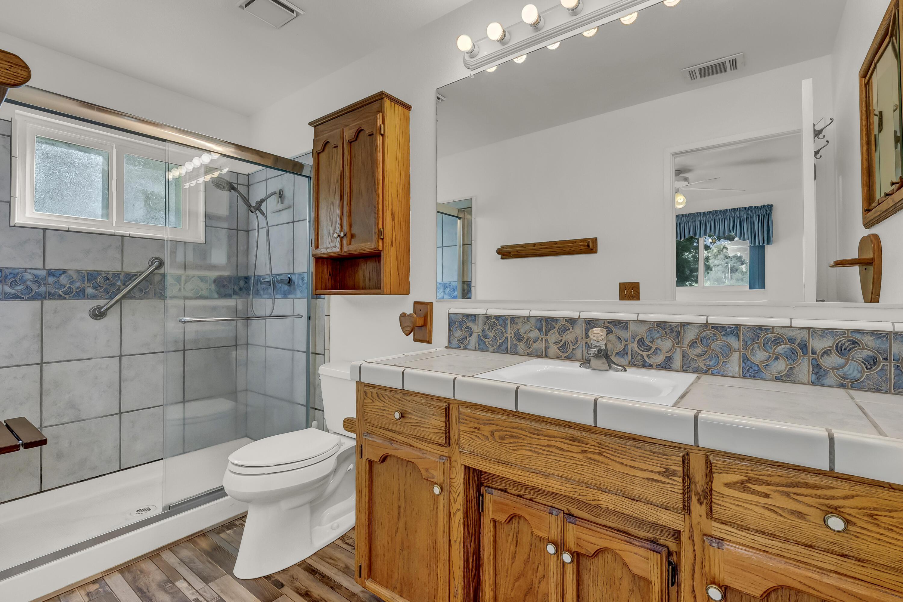 18002 320th Road Springville, CA 93265 - Photo 41 of 56 a bathroom with a sink toilet and shower
