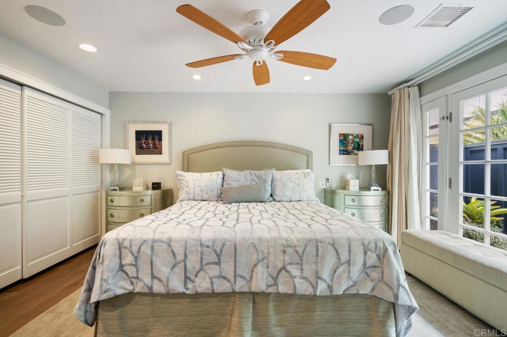 2028 Ocean Front Del Mar, CA 92014 - Photo 22 of 32 a bedroom with a bed and window