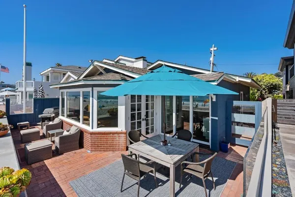 a view of a house with a lounge chair