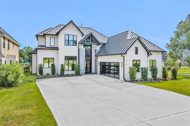 a view of a lake with houses in the background