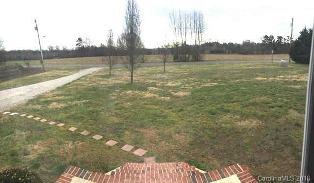 5800 Laney Rogers Road Monroe, NC 28112 - Photo 2 of 21 a view of a lake from a yard