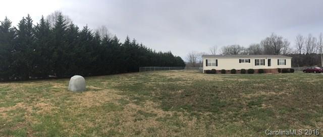 5800 Laney Rogers Road Monroe, NC 28112 - Photo 3 of 21 a view of a house with a yard and sitting area