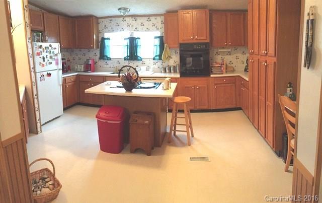 5800 Laney Rogers Road Monroe, NC 28112 - Photo 8 of 21 a kitchen with a sink refrigerator and window