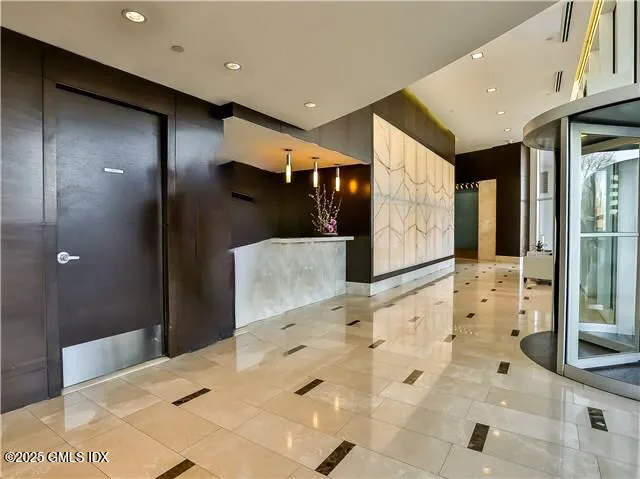 a bathroom with a large mirror