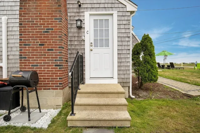 a bedroom with a bed and a desk