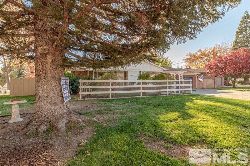 710 West 12th Street Reno, NV 89503 - Photo 1 of 25 a view of outdoor space with deck and tree
