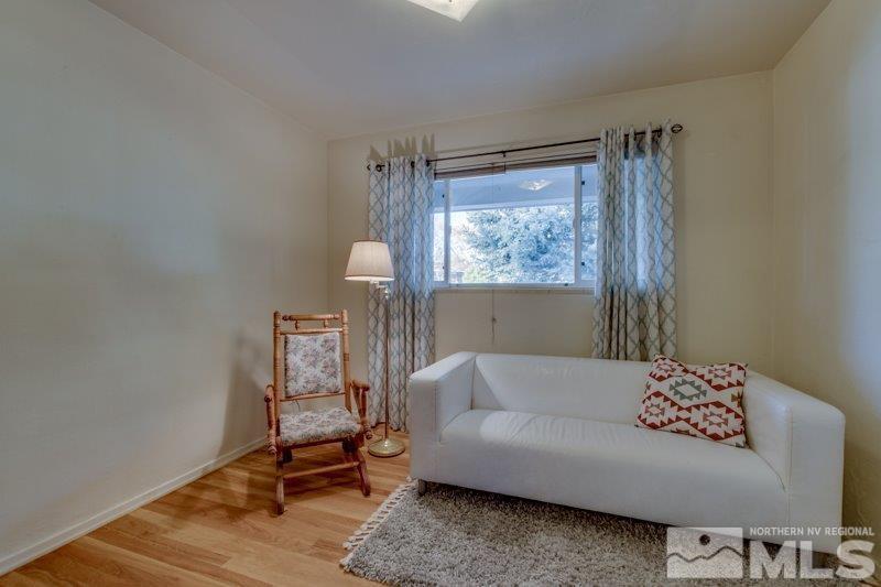710 West 12th Street Reno, NV 89503 - Photo 14 of 25 a living room with furniture and a window