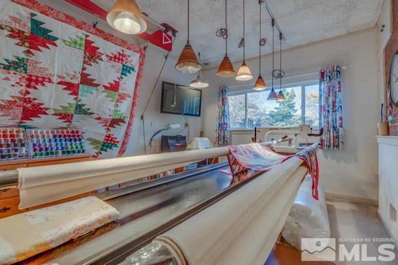 710 West 12th Street Reno, NV 89503 - Photo 20 of 25 a room with musical instruments and a flat screen tv