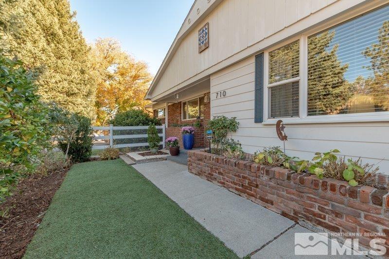 710 West 12th Street Reno, NV 89503 - Photo 4 of 25 a front view of a house with garden