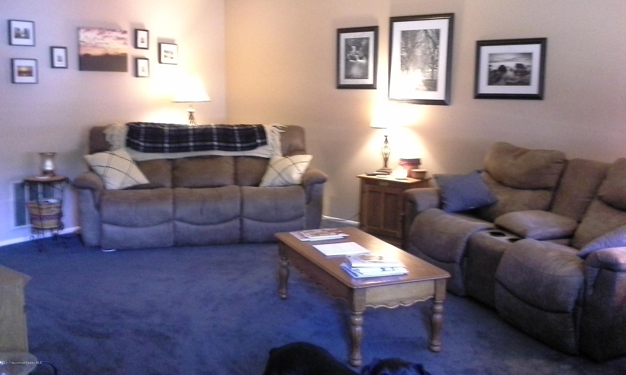 478 Rena Court Brick, NJ 08724 - Photo 2 of 13 a living room with furniture and a window