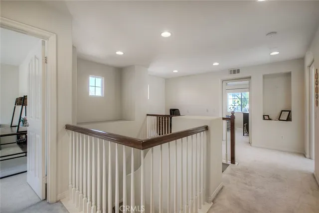 a view of hallway with livingroom