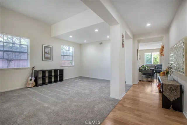 a view of livingroom with furniture and windows
