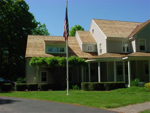 17 Laurel Hollow Road Boxford, MA 01921 - Photo 29 of 30 a front view of a house with a yard