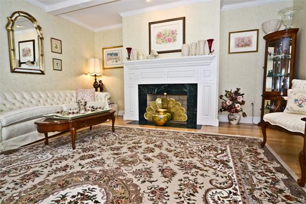 17 Laurel Hollow Road Boxford, MA 01921 - Photo 10 of 30 a living room with furniture and a fireplace