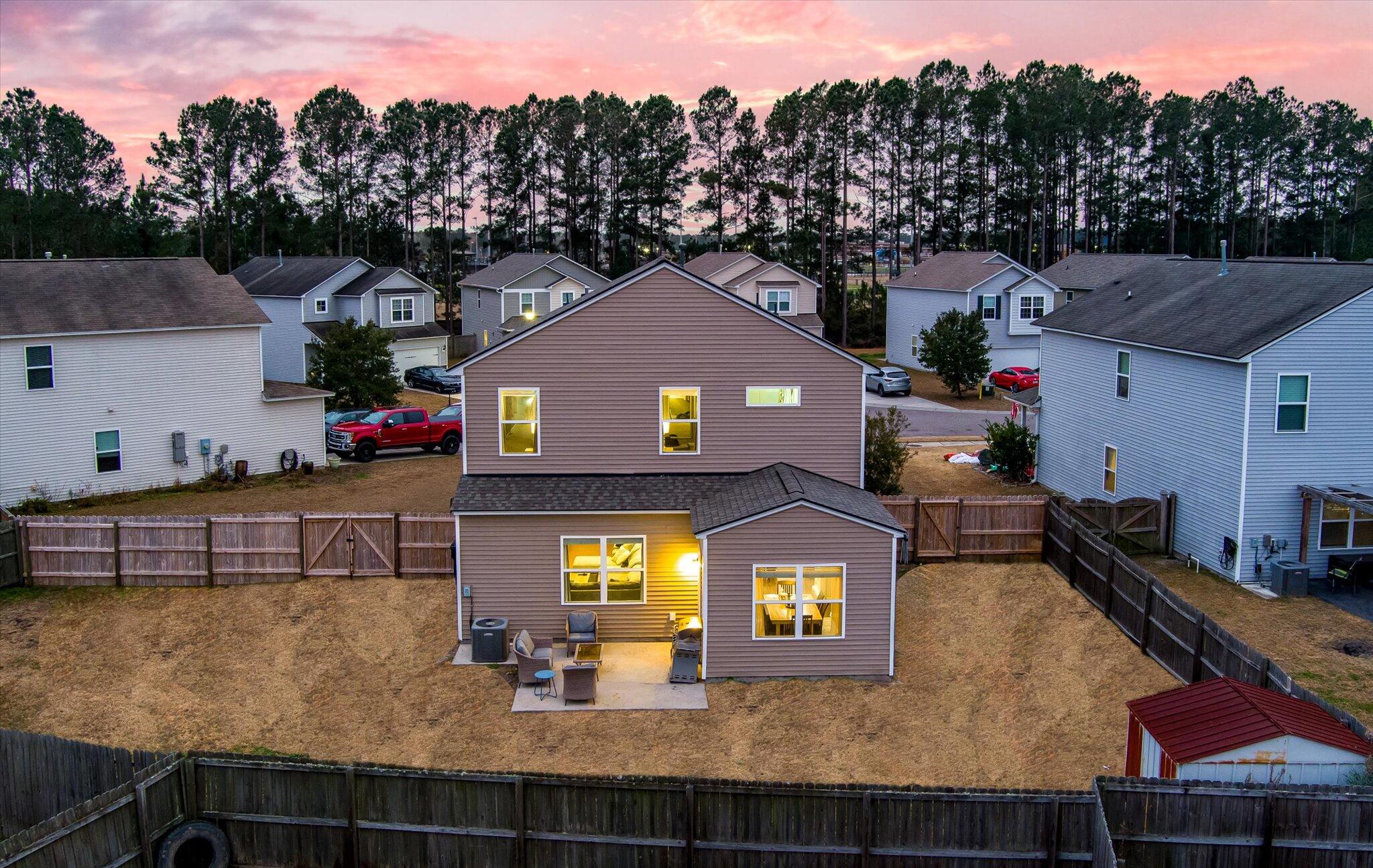 362 Iveson Road Summerville, SC 29486 - Photo 6 of 97 Twilight Aerial of Back Patio
