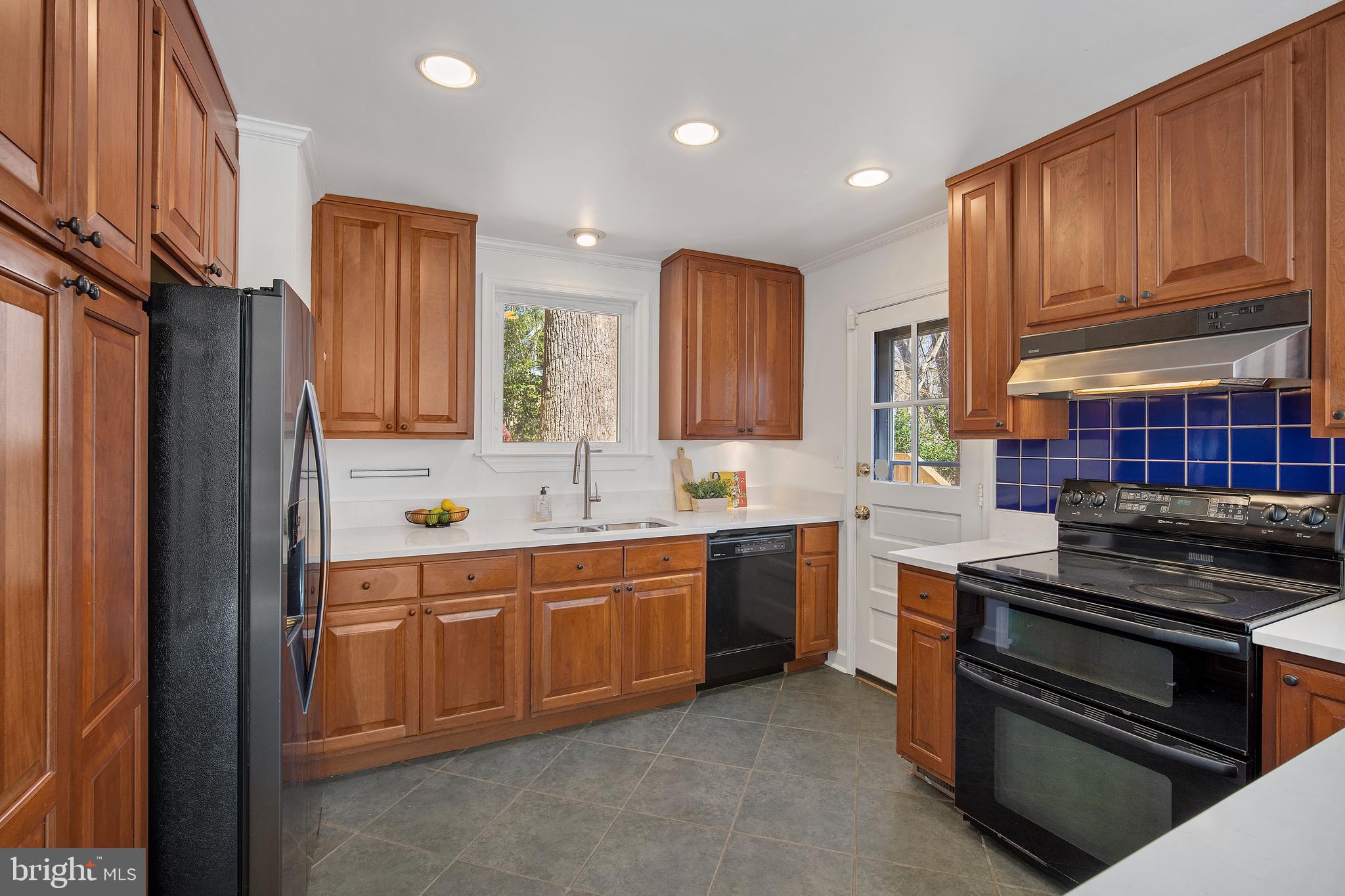 102 Park Valley Road Silver Spring, MD 20910 - Photo 8 of 46 Updated kitchen with exit to yard