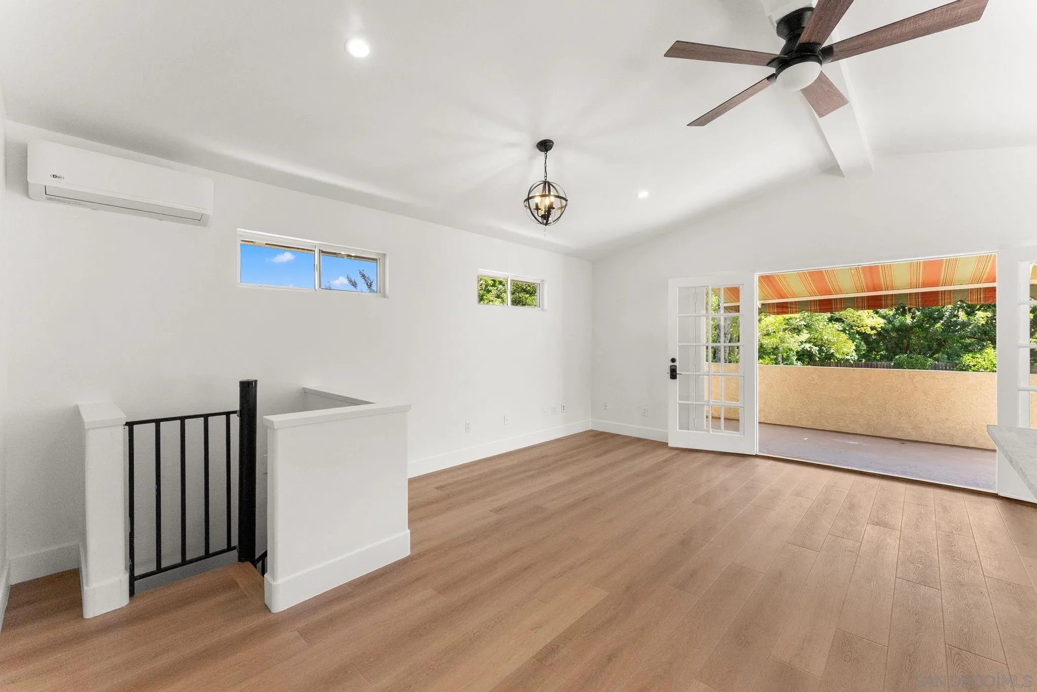 12832 Stone Canyon Road Poway, CA 92064 - Photo 41 of 60 wooden floor in an empty room with a window