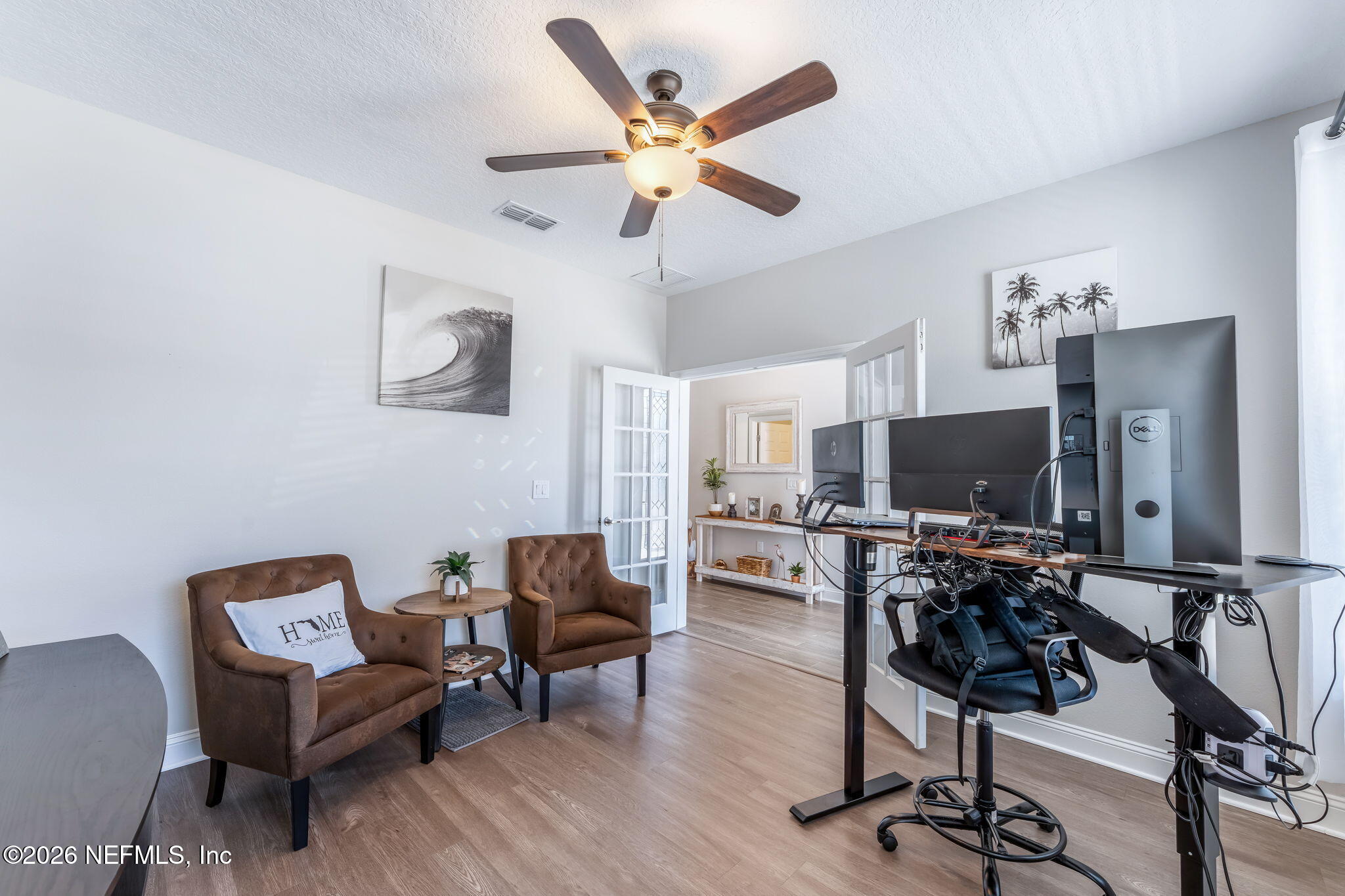 175 Convex Lane St. Augustine, FL 32095 - Photo 11 of 66 a living room with furniture and a flat screen tv