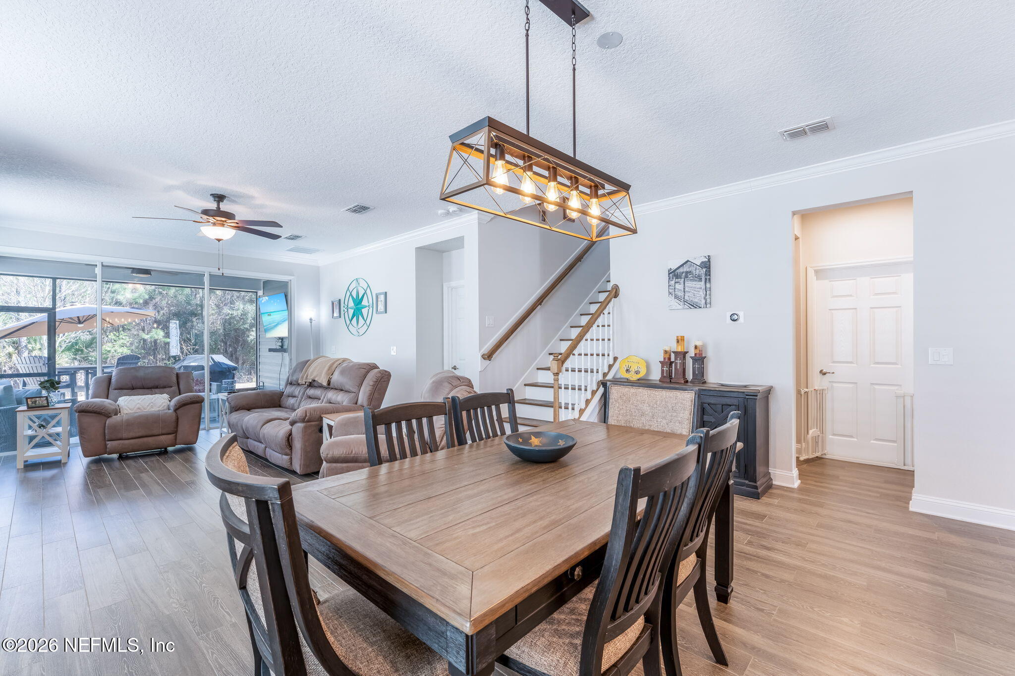 175 Convex Lane St. Augustine, FL 32095 - Photo 20 of 66 a dining room with furniture window and wooden floor