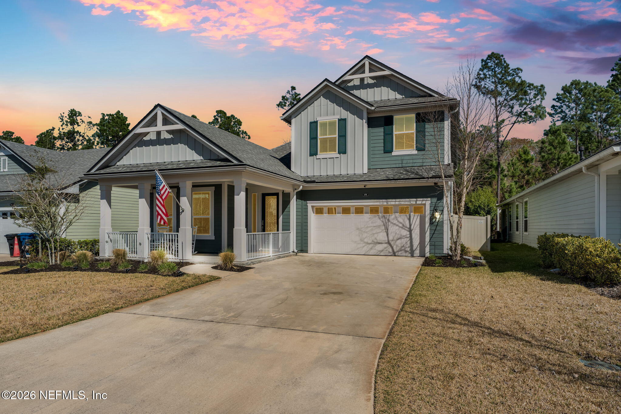 175 Convex Lane St. Augustine, FL 32095 - Photo 2 of 66 a front view of a house with a yard and garage