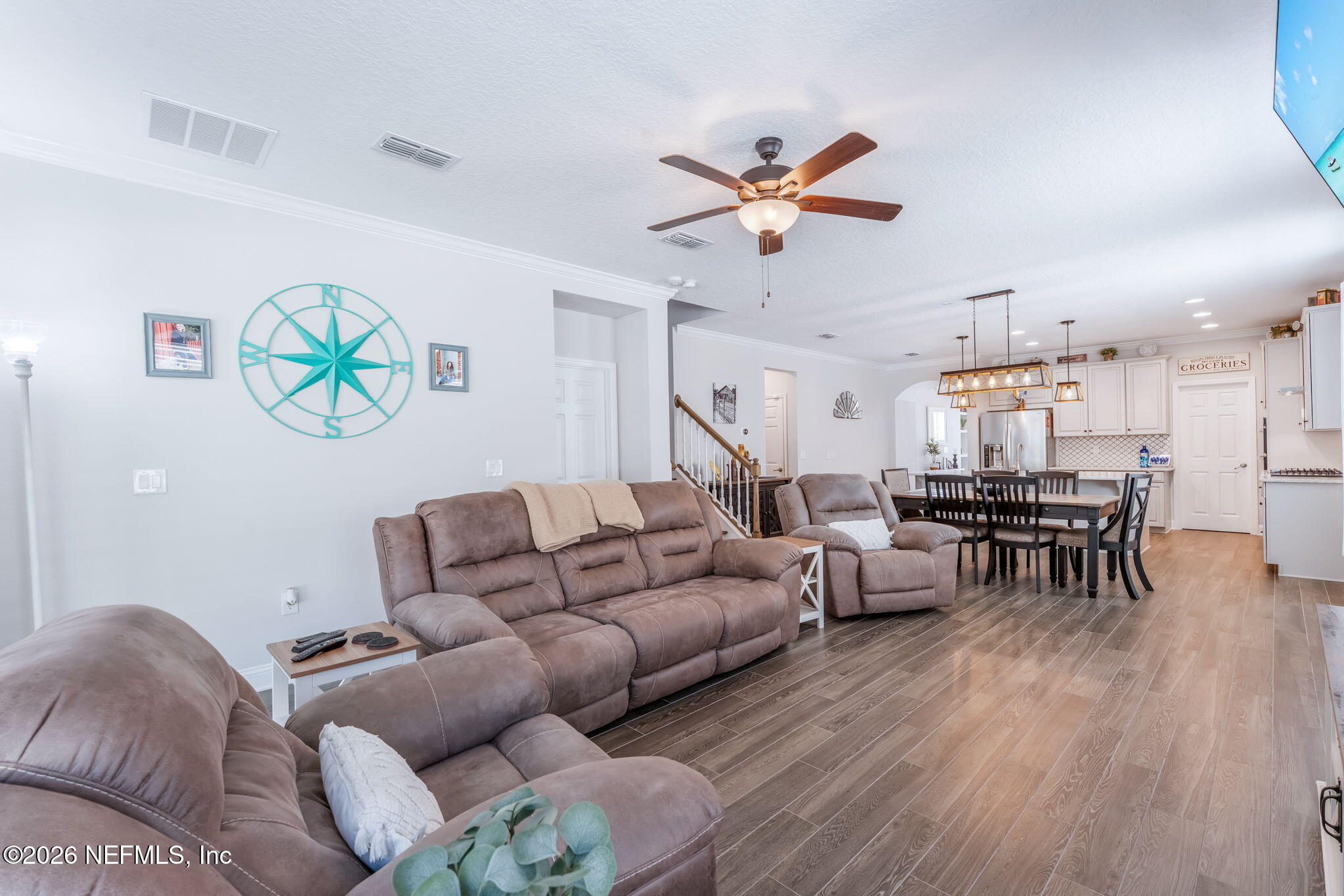 175 Convex Lane St. Augustine, FL 32095 - Photo 24 of 66 a living room with furniture and a large window