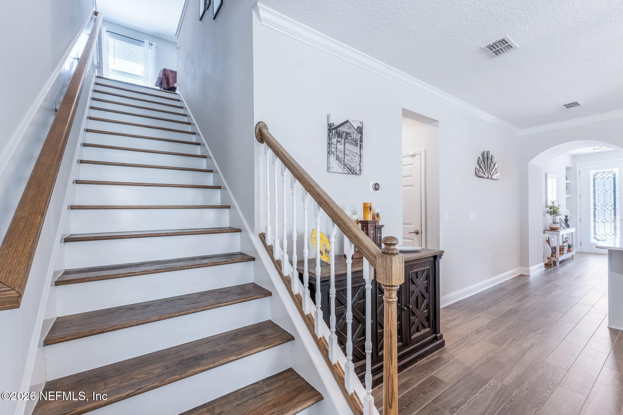 175 Convex Lane St. Augustine, FL 32095 - Photo 35 of 66 a view of a hallway with wooden floor and entryway