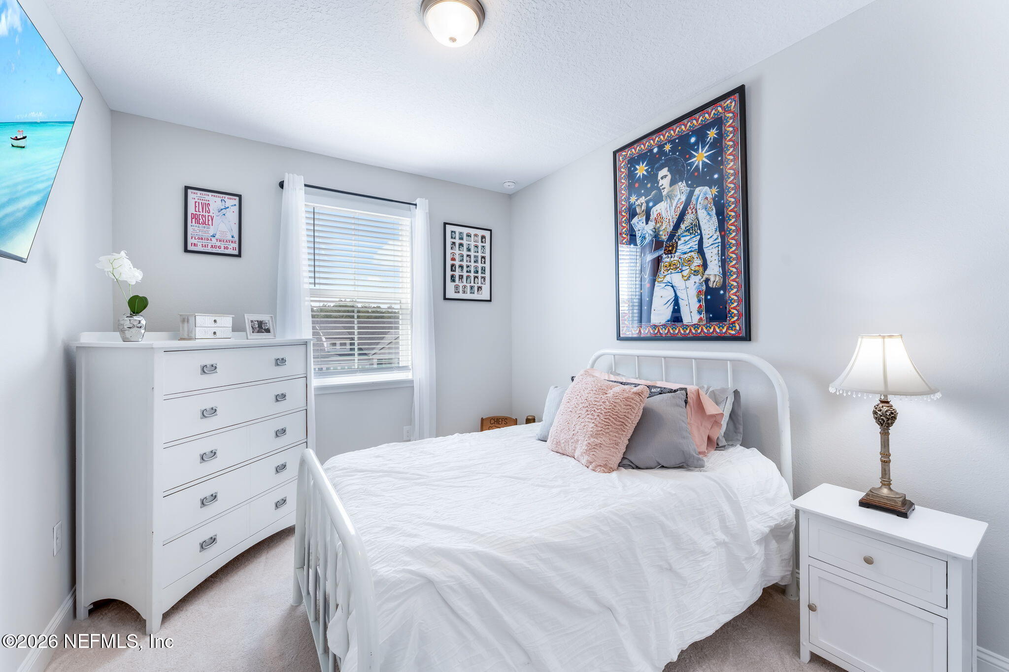 175 Convex Lane St. Augustine, FL 32095 - Photo 45 of 66 a bedroom with a bed and a window